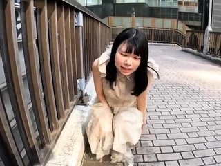 Outdoor solo masturbation scene with curly blonde