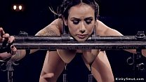 Hot big tits brunette sub bent over bound in metal device with nipples clamped and weighted