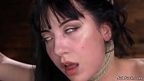 Brunette goth babe Charlotte Sartre pussy rubbed in an eagle standing bondage